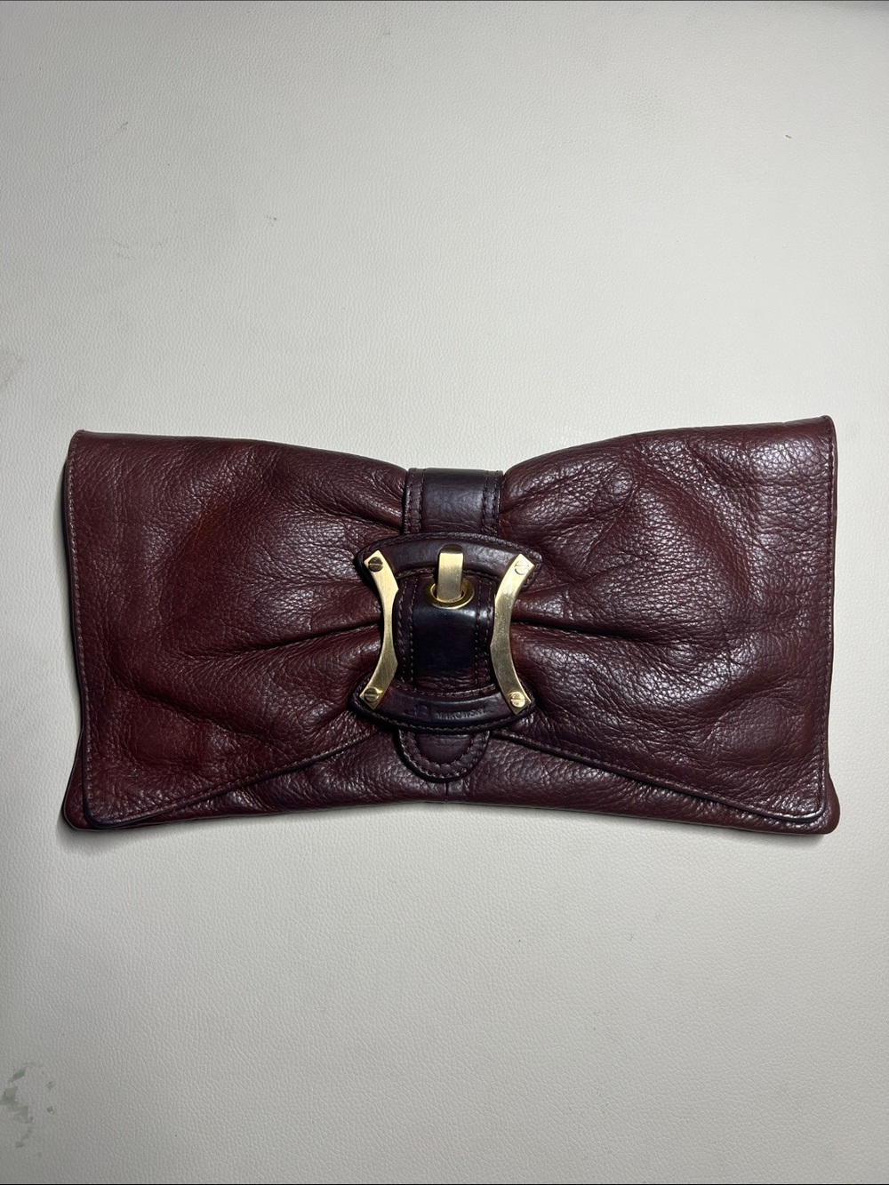 b. makowsky Burgundy Leather Bow Clutch with Gold Accent